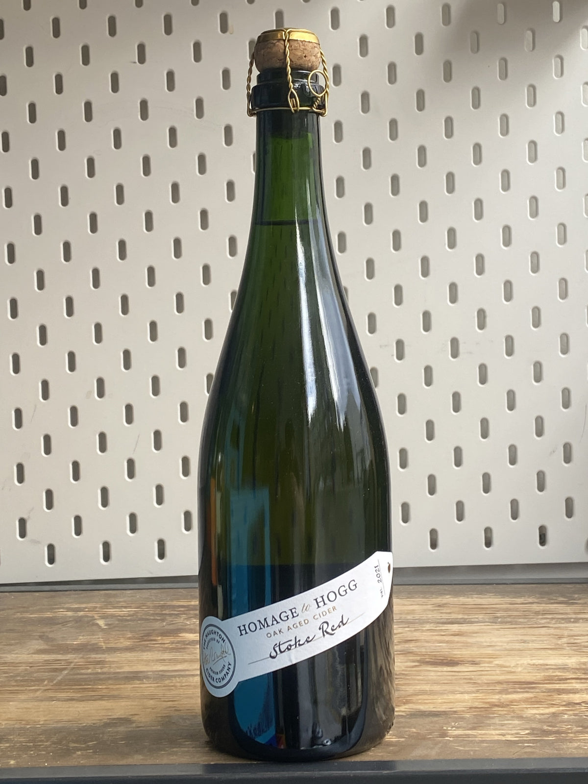 Naughton Cider Homage to Hogg Oak Aged Cider Stoke Red